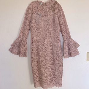 A brand new Teri Jon dress in size six and a beautiful mauve color!